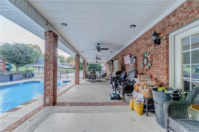 a bathroom with a sink vanity mirror and toilet