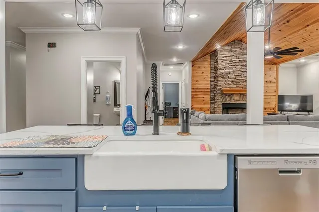 a bedroom with furniture and a flat screen tv