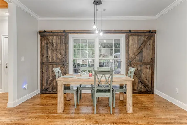 a bathroom with a double vanity sink mirror and toilet