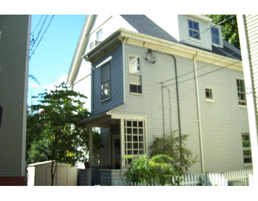 3 Reed St Court, Unit 3 Cambridge, MA 02140 - Photo 1 of 1 a view of a back yard of the house