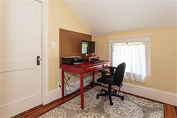 9 Fountain Road Arlington, MA 02476 - Photo 18 of 30 a view of a workspace with furniture and a window