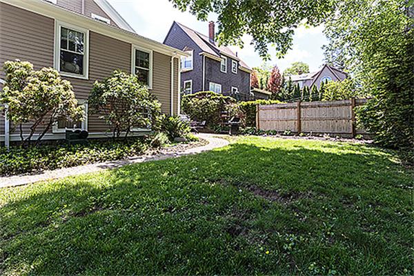9 Fountain Road Arlington, MA 02476 - Photo 28 of 30 a backyard of a house with lots of green space