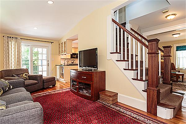 9 Fountain Road Arlington, MA 02476 - Photo 5 of 30 a living room with furniture and a flat screen tv