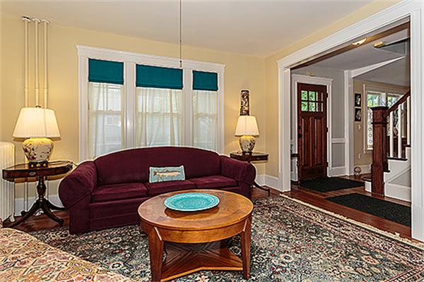 9 Fountain Road Arlington, MA 02476 - Photo 8 of 30 a living room with furniture a rug and a window