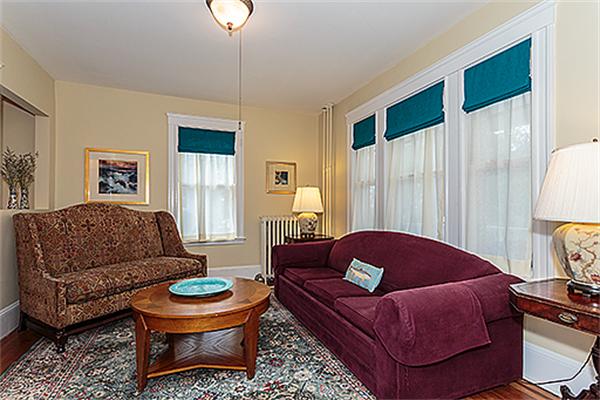9 Fountain Road Arlington, MA 02476 - Photo 10 of 30 a living room with furniture and a window