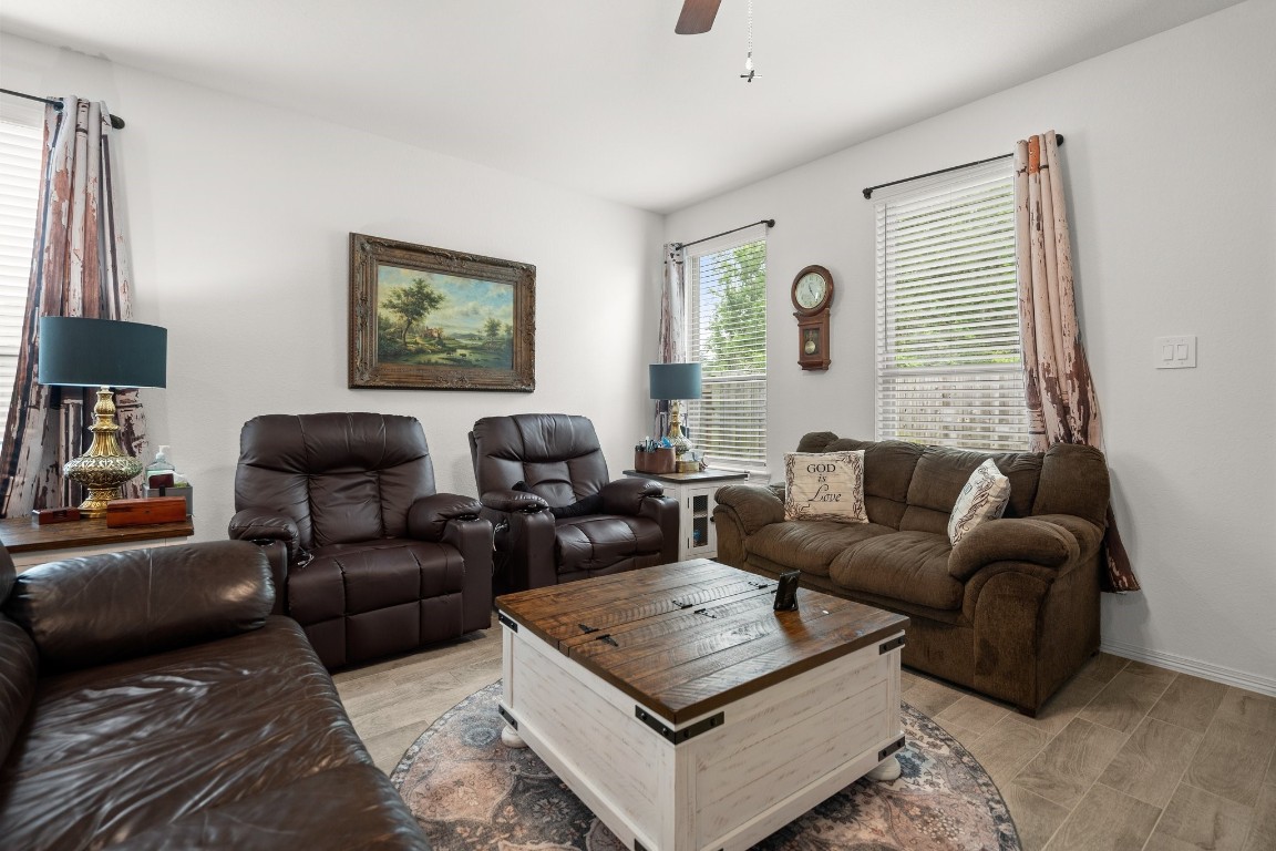 14449 Sunny Bend Way Conroe, TX 77303 - Photo 13 of 34 a living room with furniture and a window