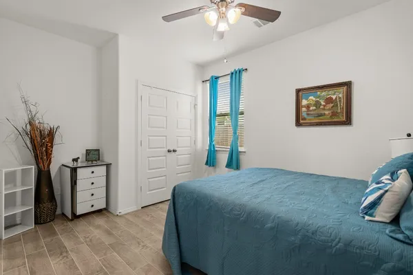 a bathroom with a sink double vanity and a shower
