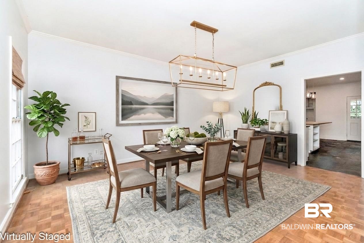 4776 Falls Church Road Mobile, AL 36608 - Photo 6 of 45 Dining area featuring wood-finish parquet flooring, a modern linear chandelier, and a wide entryway