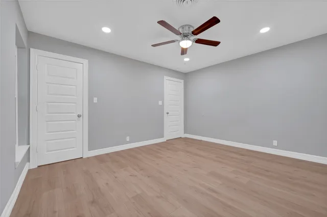 a bathroom with a white bath tub