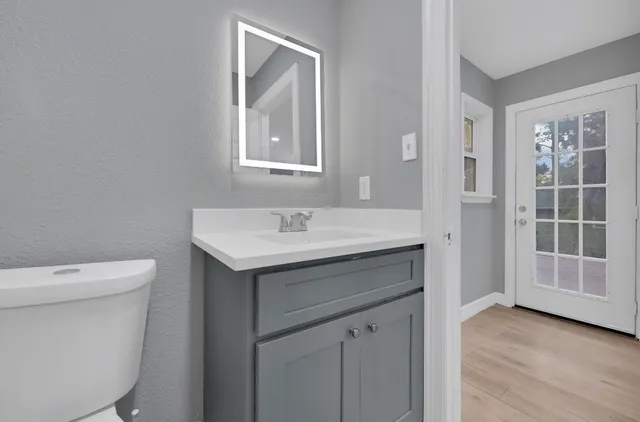 a view of backyard with green space