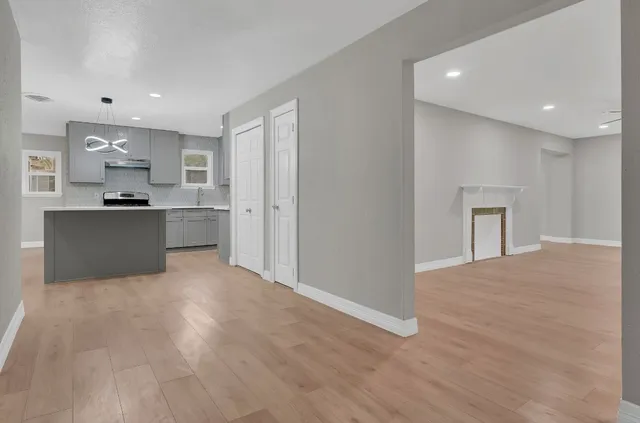 a view of kitchen with wooden floor