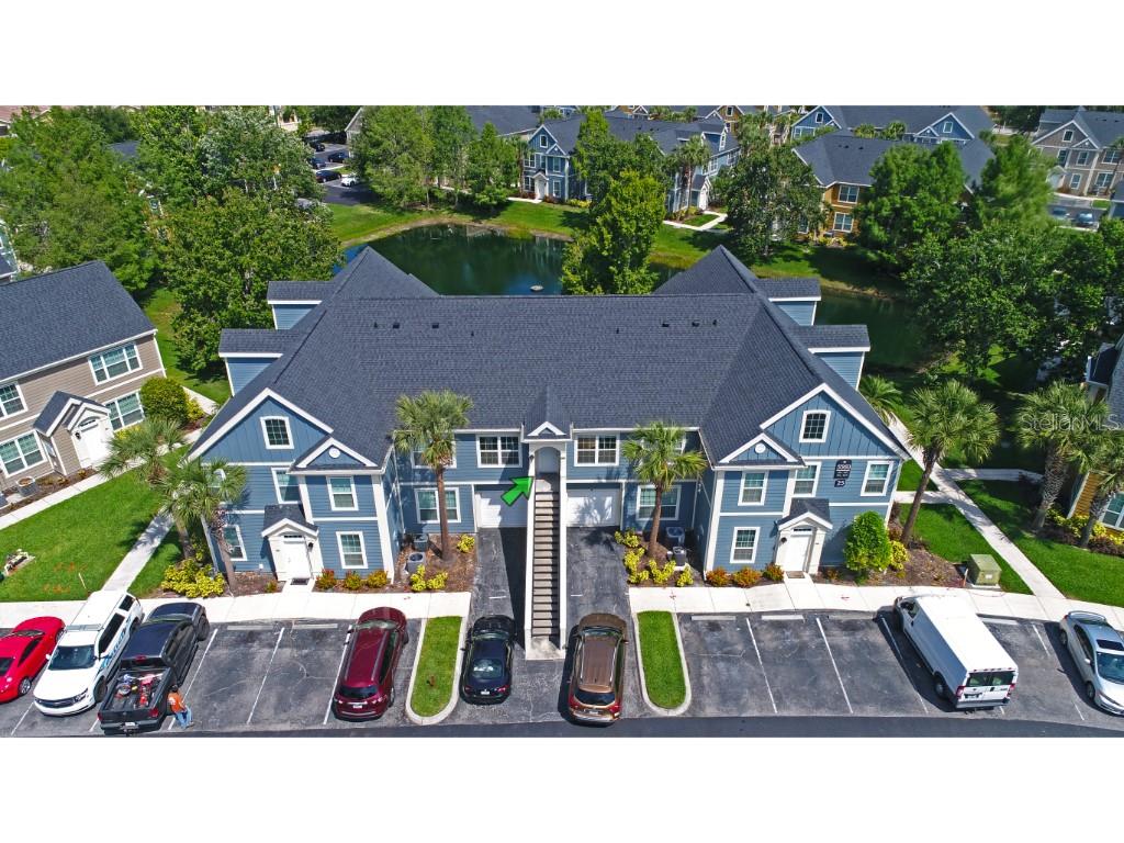 5560 Rosehill Road, Unit 202 Sarasota, FL 34233 - Photo 1 of 1 a aerial view of houses with deck