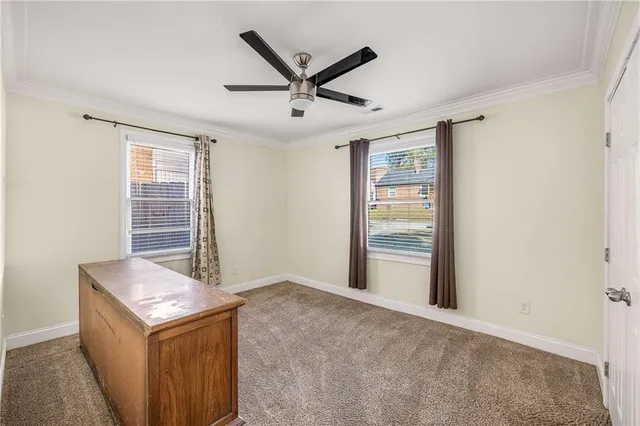 a living room with a stove and a window