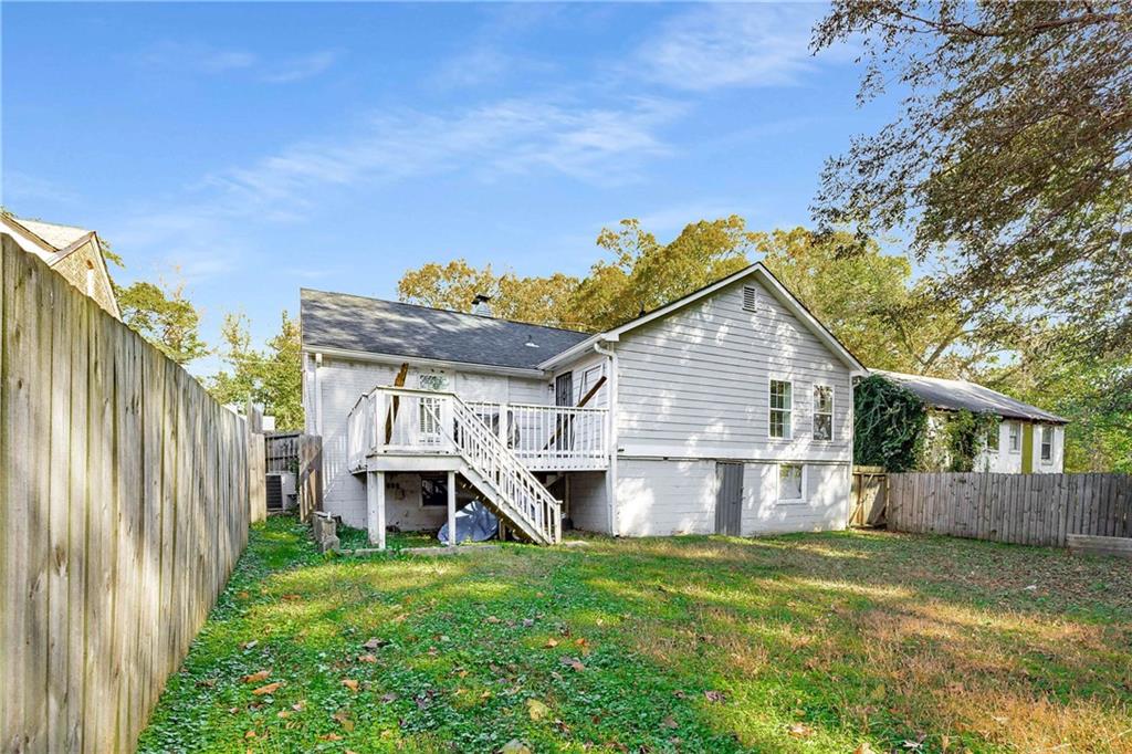 1674 Browning Street Southwest Atlanta, GA 30314 - Photo 29 of 35 a house view with a garden space