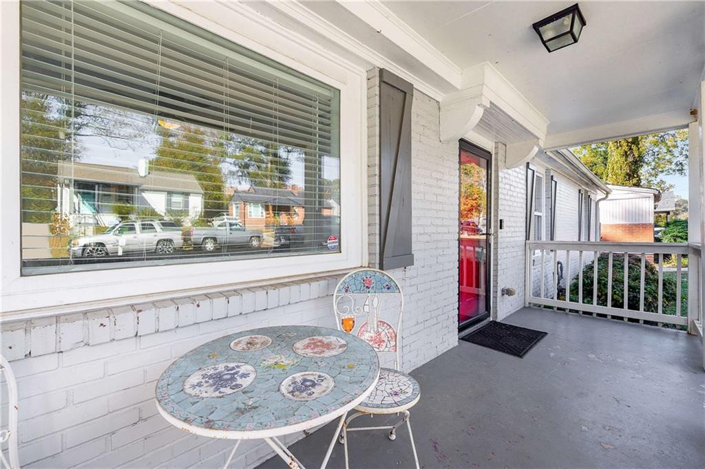 1674 Browning Street Southwest Atlanta, GA 30314 - Photo 4 of 35 a view of a dining room with furniture window and outside view