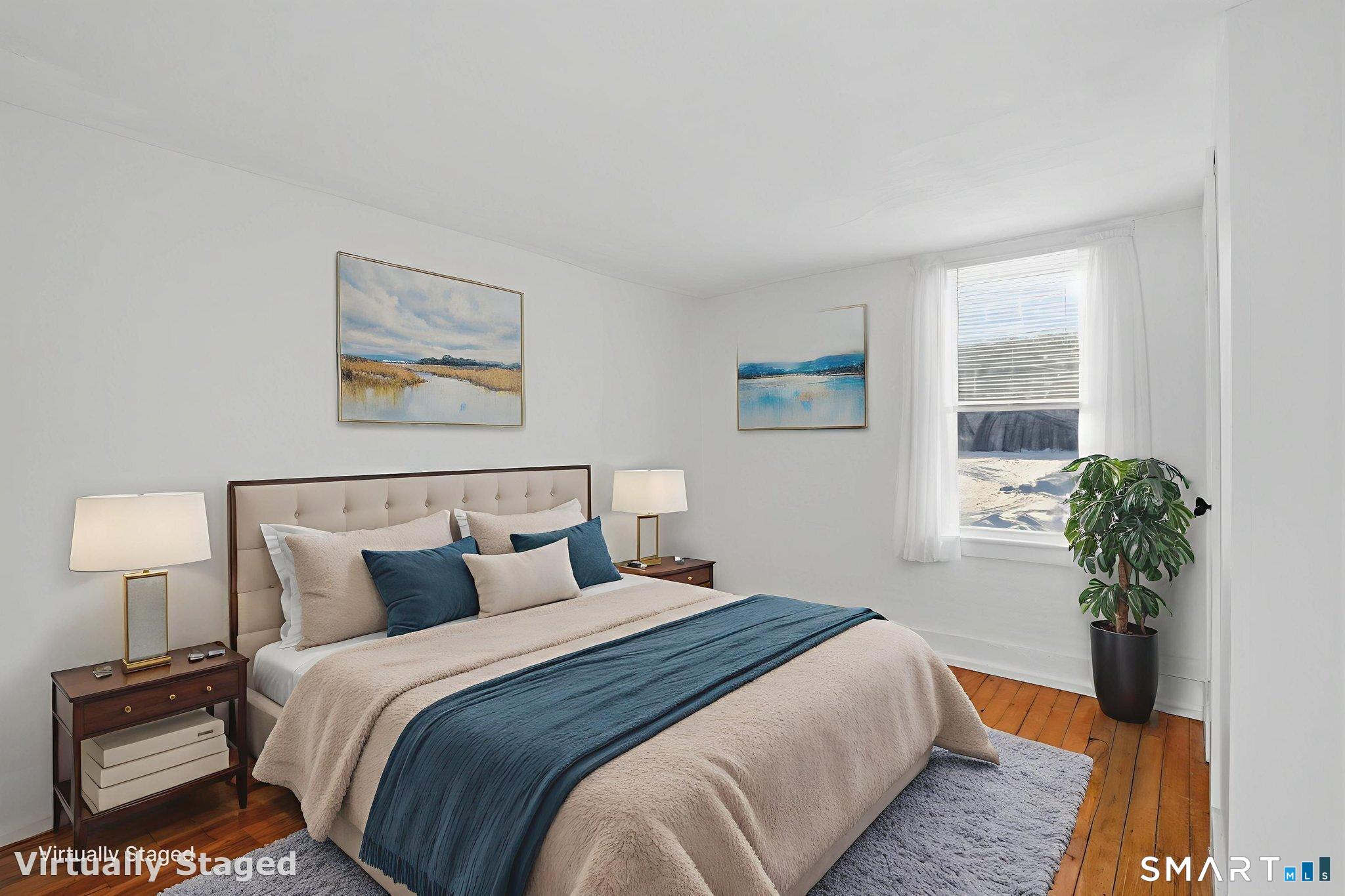 380 North Granby Road Granby, CT 06060 - Photo 12 of 39 a bedroom with bed and a potted plant