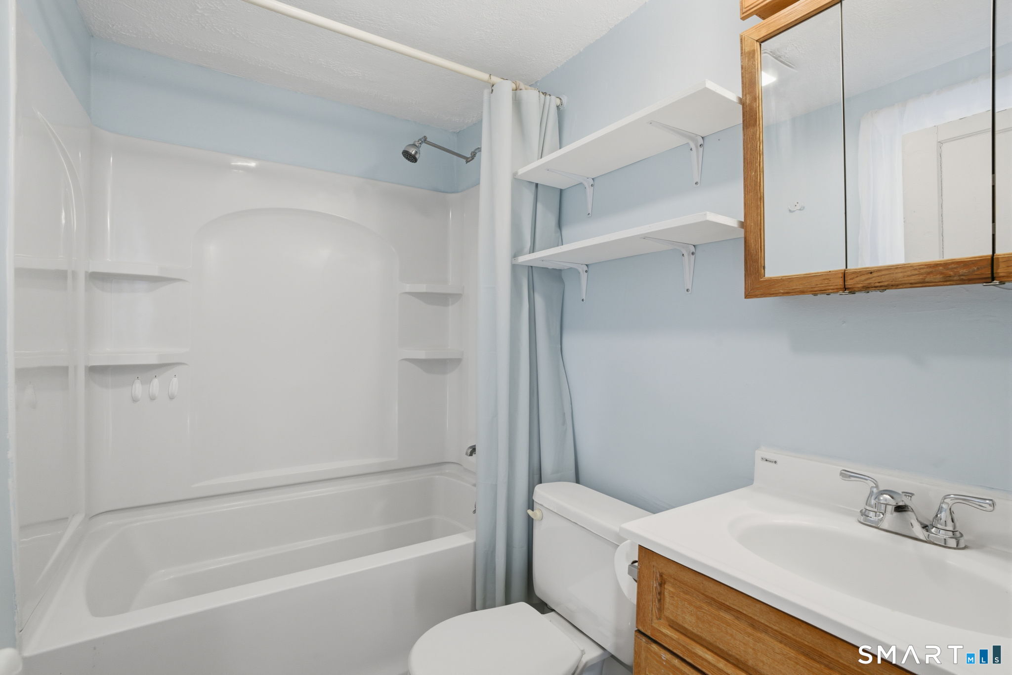 380 North Granby Road Granby, CT 06060 - Photo 14 of 39 a bathroom with a sink a toilet and shower