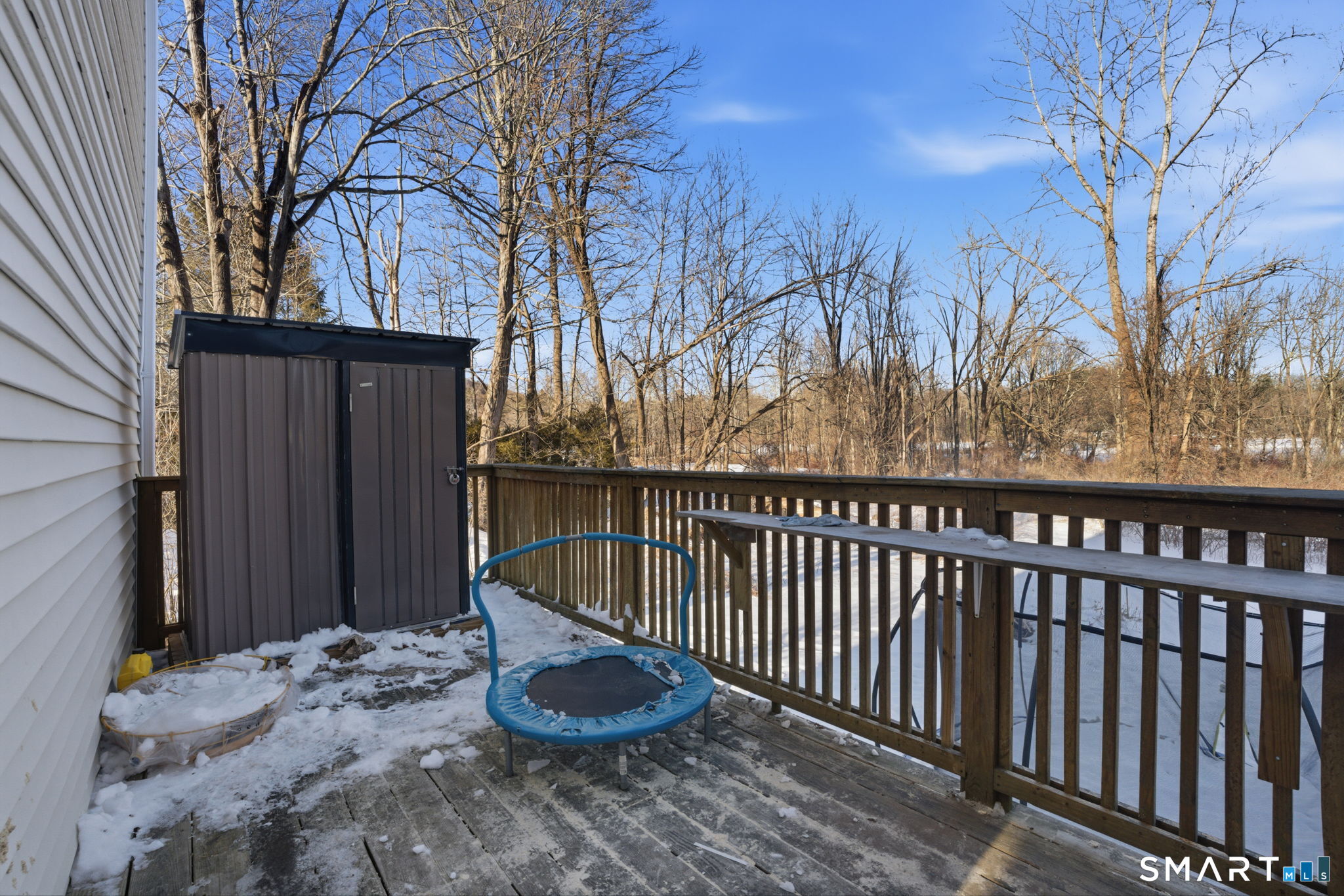 380 North Granby Road Granby, CT 06060 - Photo 15 of 39 a view of a wooden floor and trees in the back yard