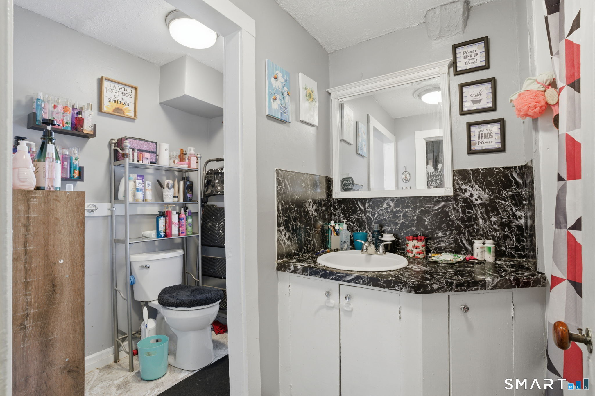 380 North Granby Road Granby, CT 06060 - Photo 21 of 39 a bathroom with a sink and a mirror