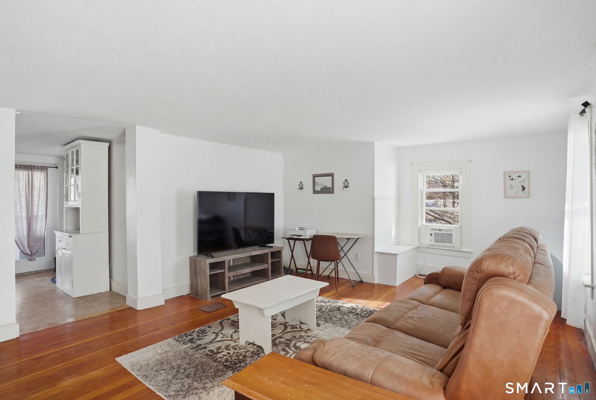 380 North Granby Road Granby, CT 06060 - Photo 23 of 39 a living room with furniture and a flat screen tv