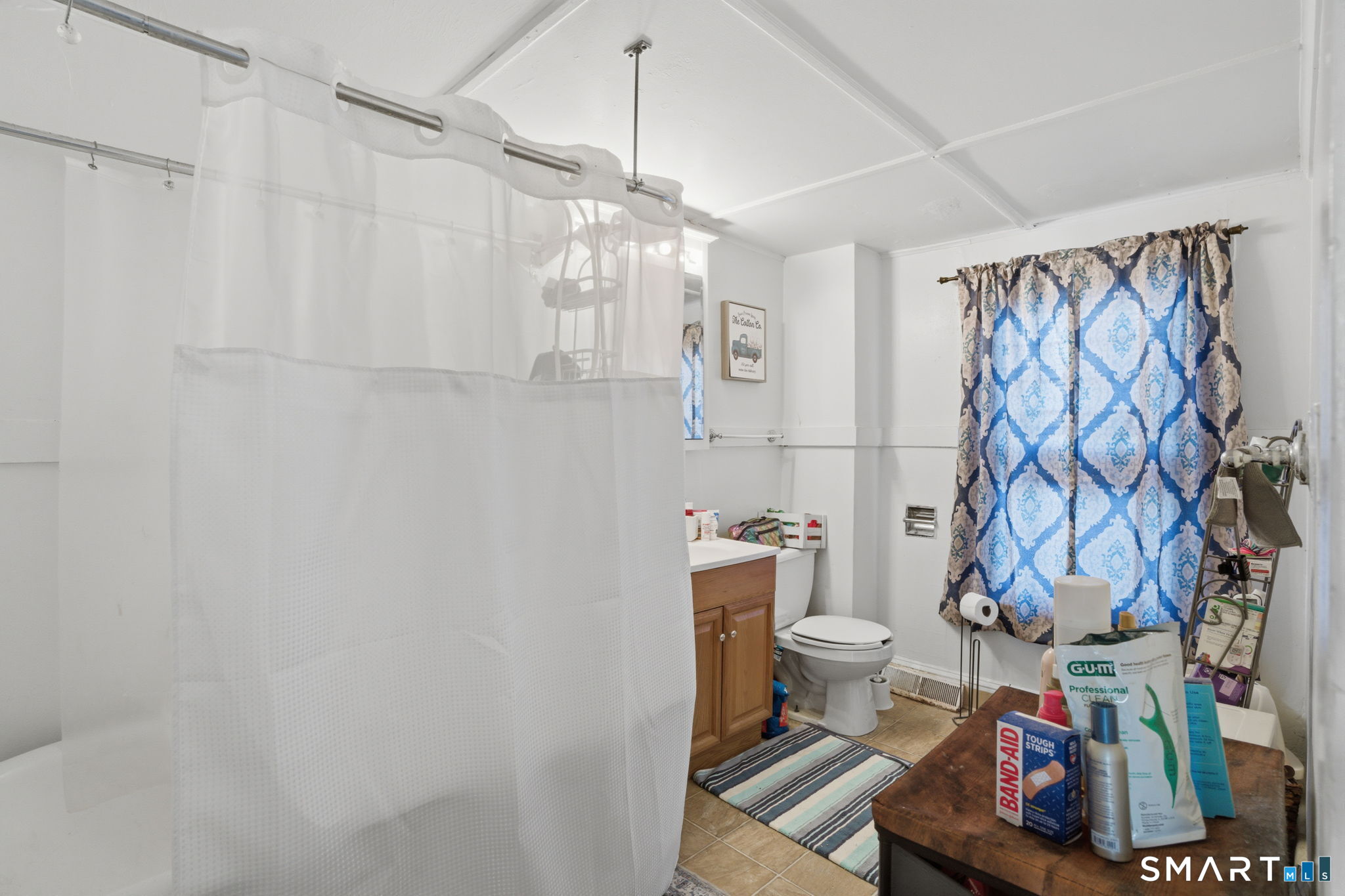 380 North Granby Road Granby, CT 06060 - Photo 28 of 39 a bathroom with a toilet and a shower curtain