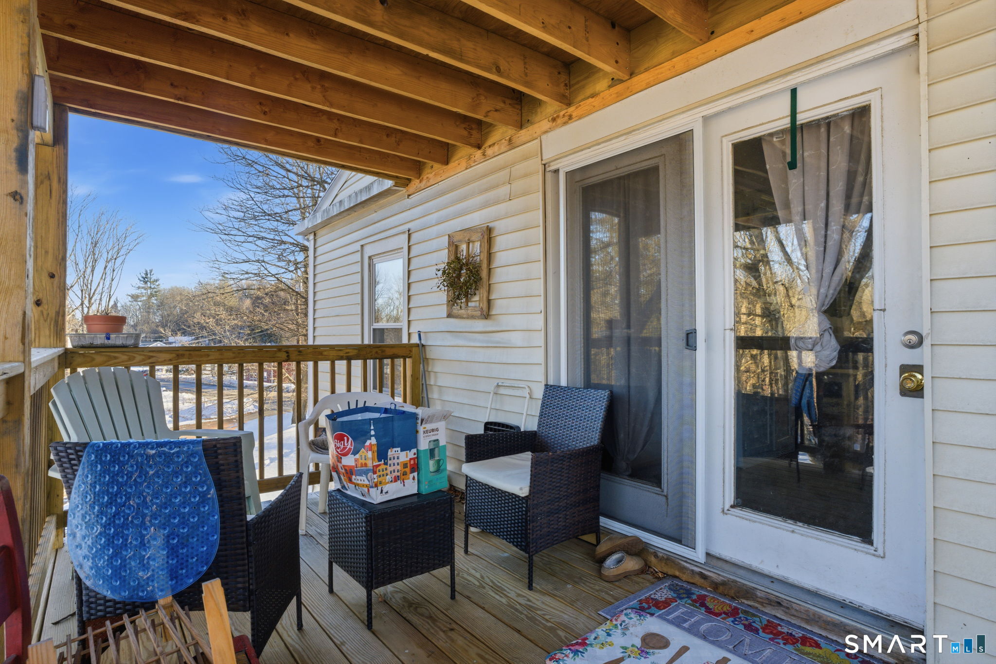 380 North Granby Road Granby, CT 06060 - Photo 29 of 39 a balcony with furniture and wooden floor