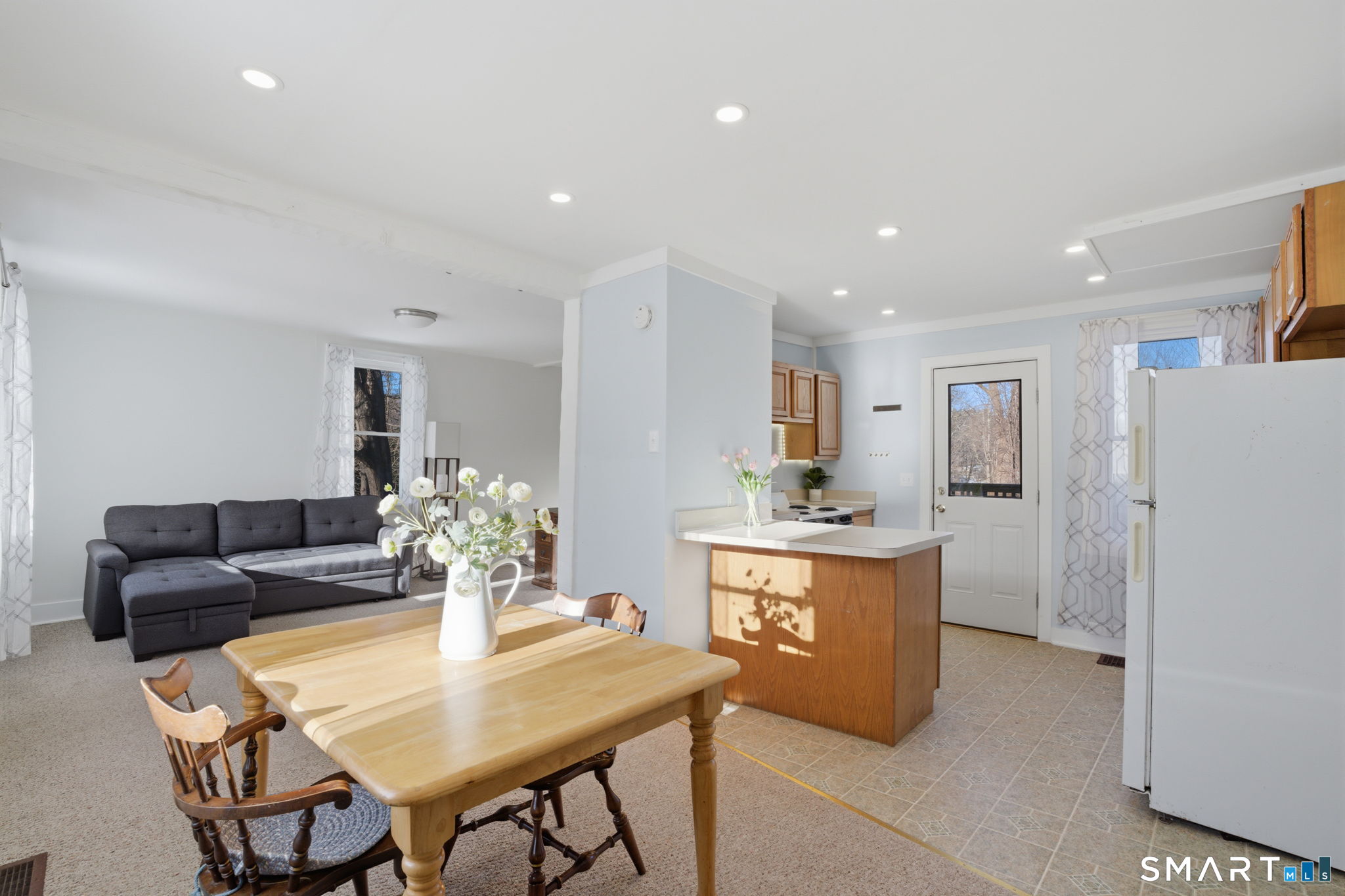 380 North Granby Road Granby, CT 06060 - Photo 7 of 39 a living room with furniture a dining table and chairs