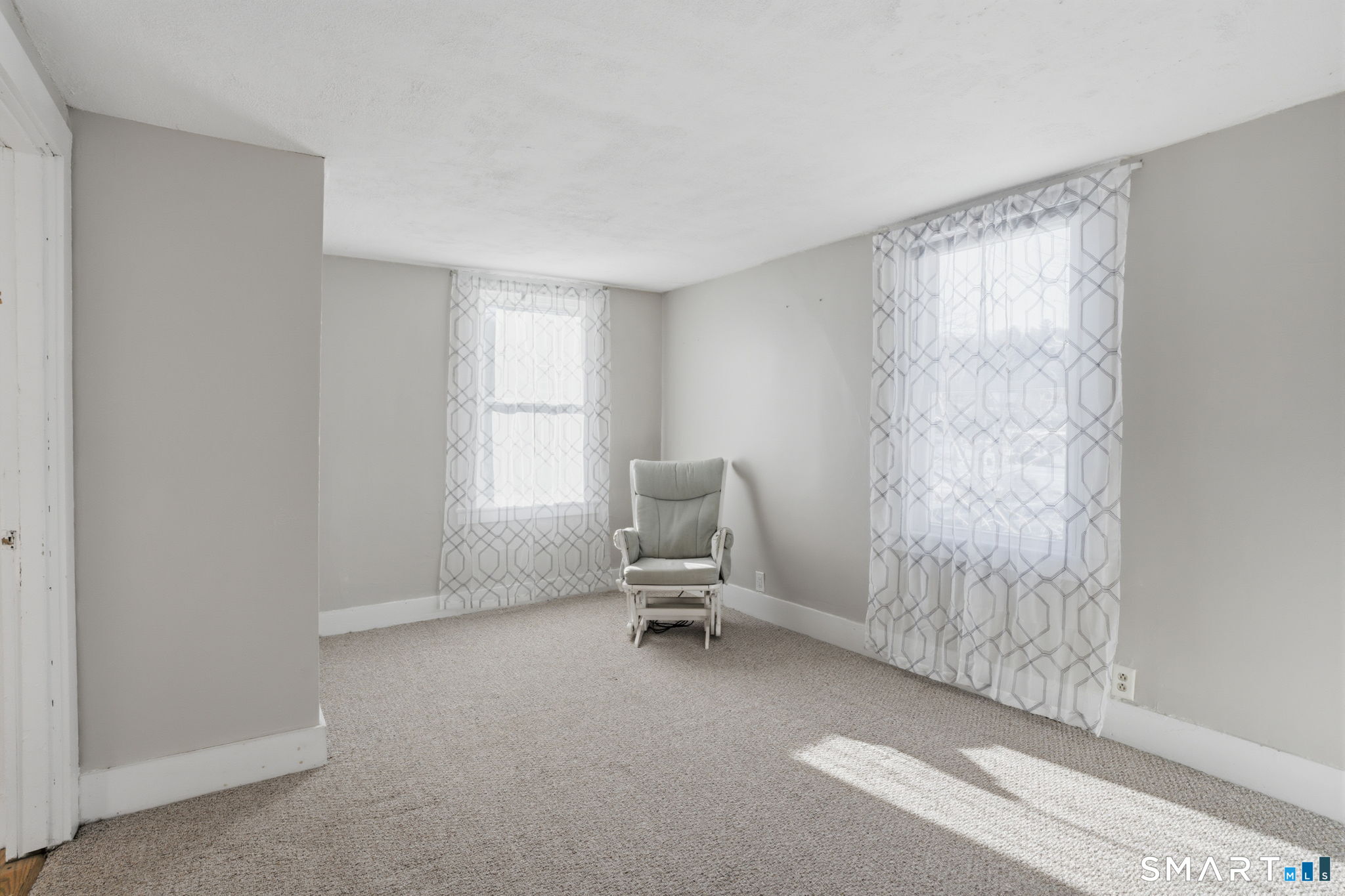 380 North Granby Road Granby, CT 06060 - Photo 10 of 39 a living room with furniture and a window