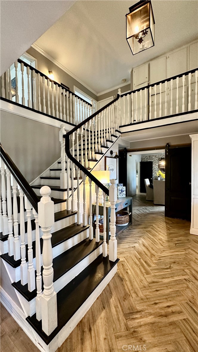 19559 Tulsa Street Porter Ranch, CA 91326 - Photo 21 of 55 a view of entryway livingroom and hall with wooden floor