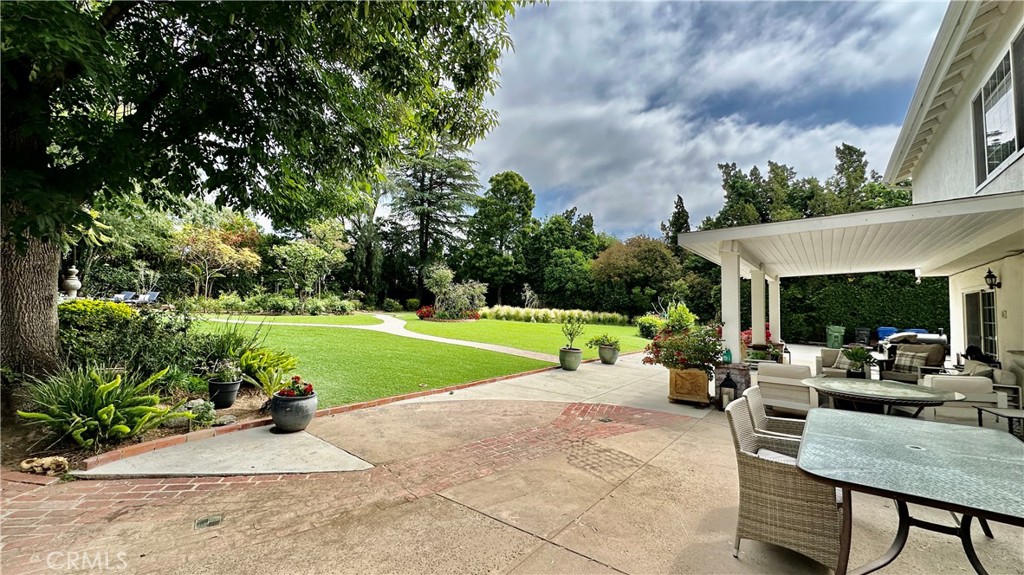19559 Tulsa Street Porter Ranch, CA 91326 - Photo 37 of 55 a view of a house with backyard and porch
