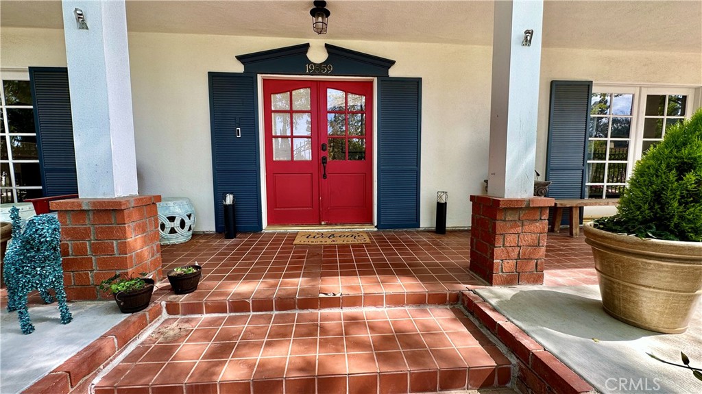 19559 Tulsa Street Porter Ranch, CA 91326 - Photo 4 of 55 a bedroom with a bed and wooden floor