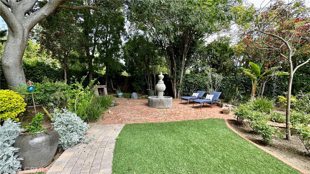 19559 Tulsa Street Porter Ranch, CA 91326 - Photo 44 of 55 a view of a backyard with sitting area