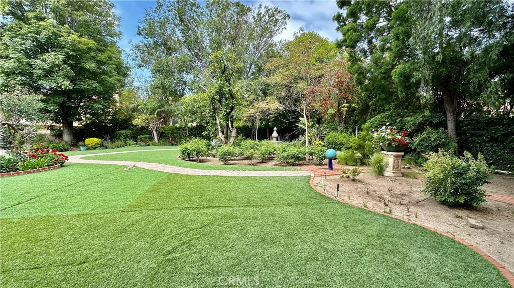 19559 Tulsa Street Porter Ranch, CA 91326 - Photo 52 of 55 a view of a park with large trees