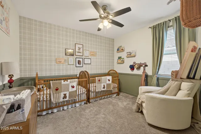 a bedroom with furniture and a window