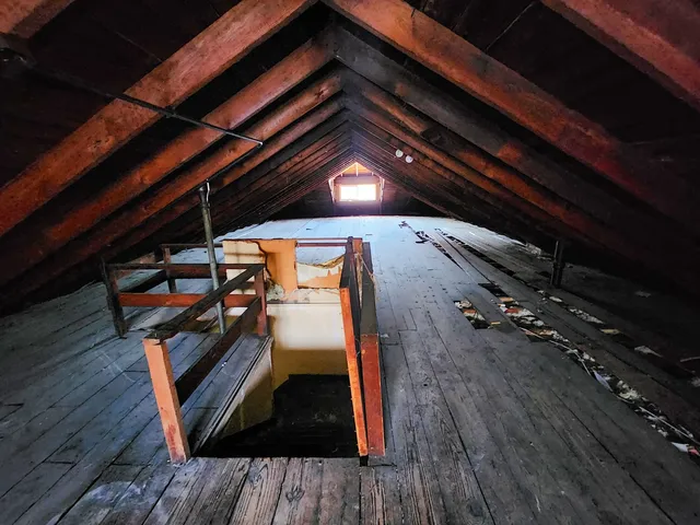 a view of outdoor space with wooden floor and staircase