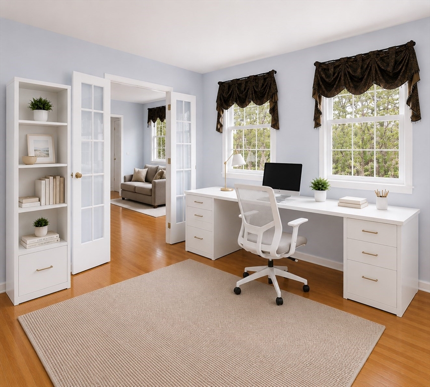 10 Hawk Ridge Road Andover, MA 01810 - Photo 14 of 32 a view of a workspace with furniture and a window