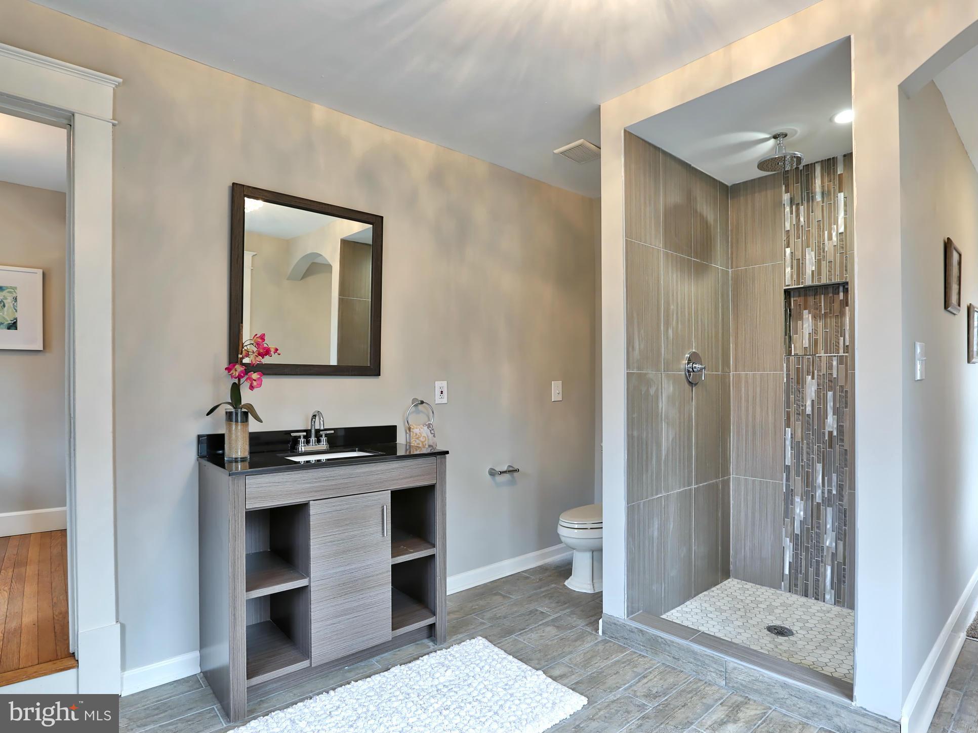 515 Old Orchard Road Baltimore, MD 21229 - Photo 17 of 30 Rainfall Shower with Custom Tile Work