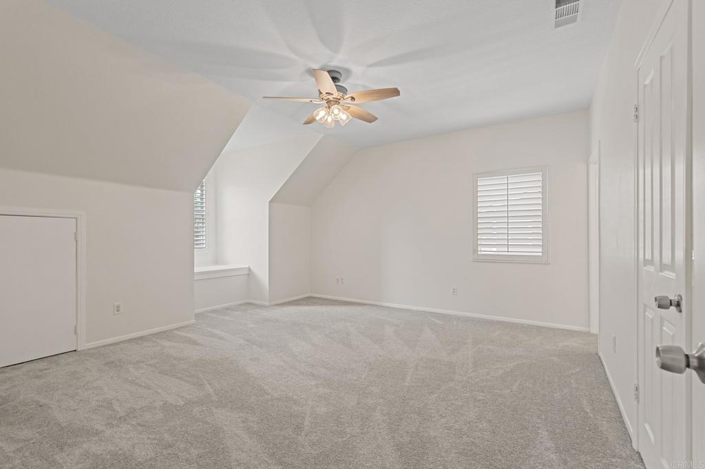 14403 Gaslight Court Poway, CA 92064 - Photo 31 of 58 a view of an empty room with a window