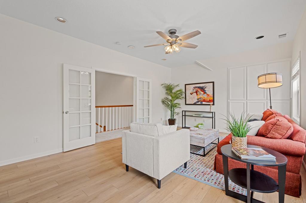 14403 Gaslight Court Poway, CA 92064 - Photo 34 of 58 a living room with furniture and wooden floor