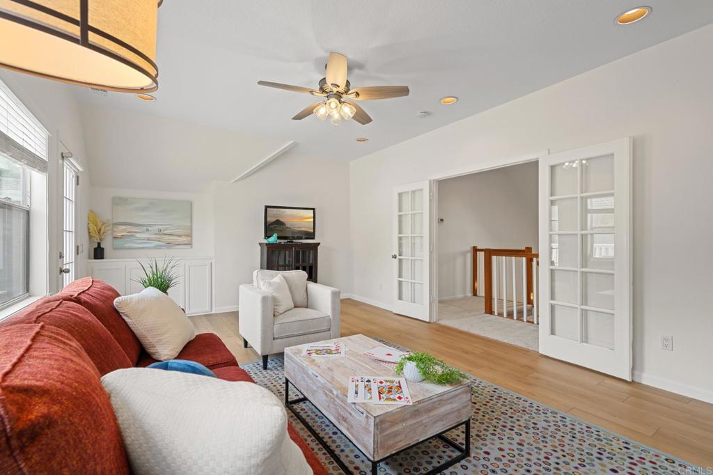 14403 Gaslight Court Poway, CA 92064 - Photo 35 of 58 a living room with furniture and a window