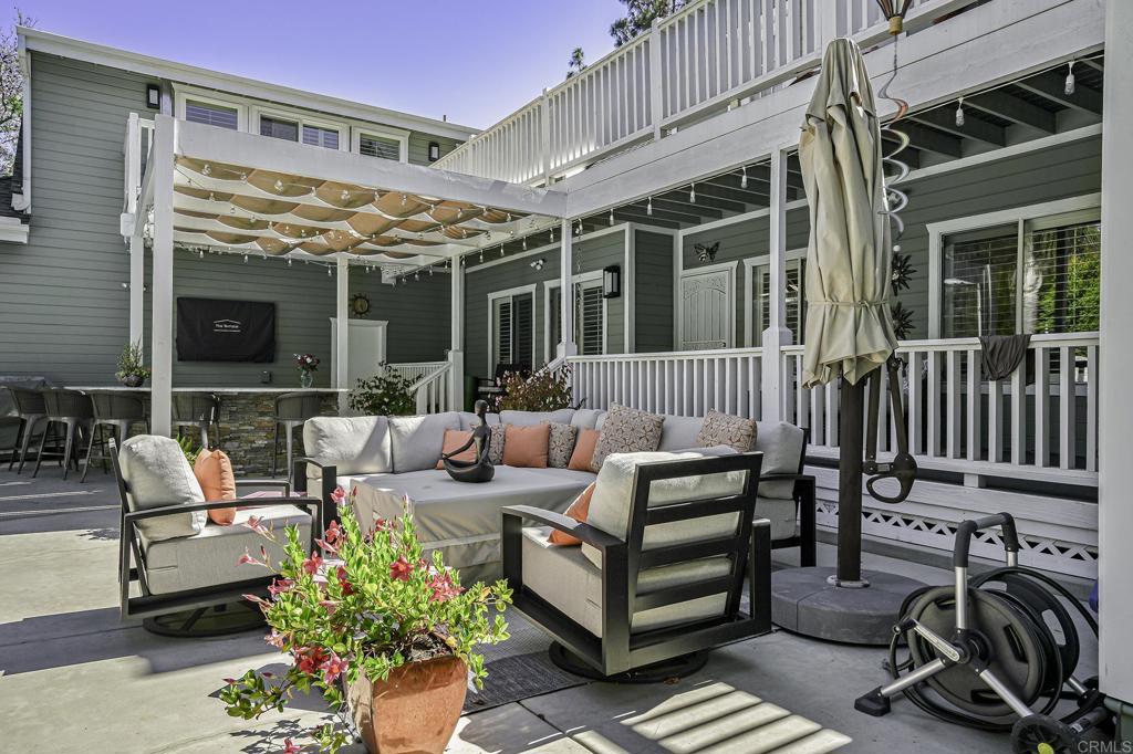 14403 Gaslight Court Poway, CA 92064 - Photo 44 of 58 a outdoor living space with patio furniture and a potted plant