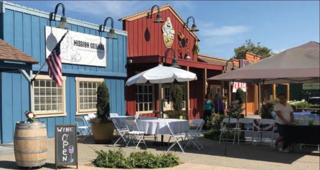 14403 Gaslight Court Poway, CA 92064 - Photo 54 of 58 a front view of a building with sitting area