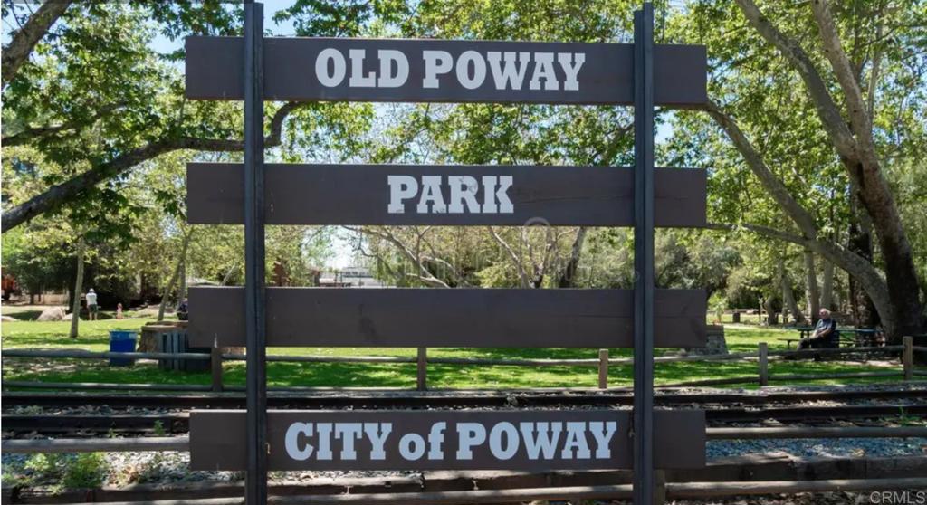 14403 Gaslight Court Poway, CA 92064 - Photo 56 of 58 a view of a sign board with a small yard