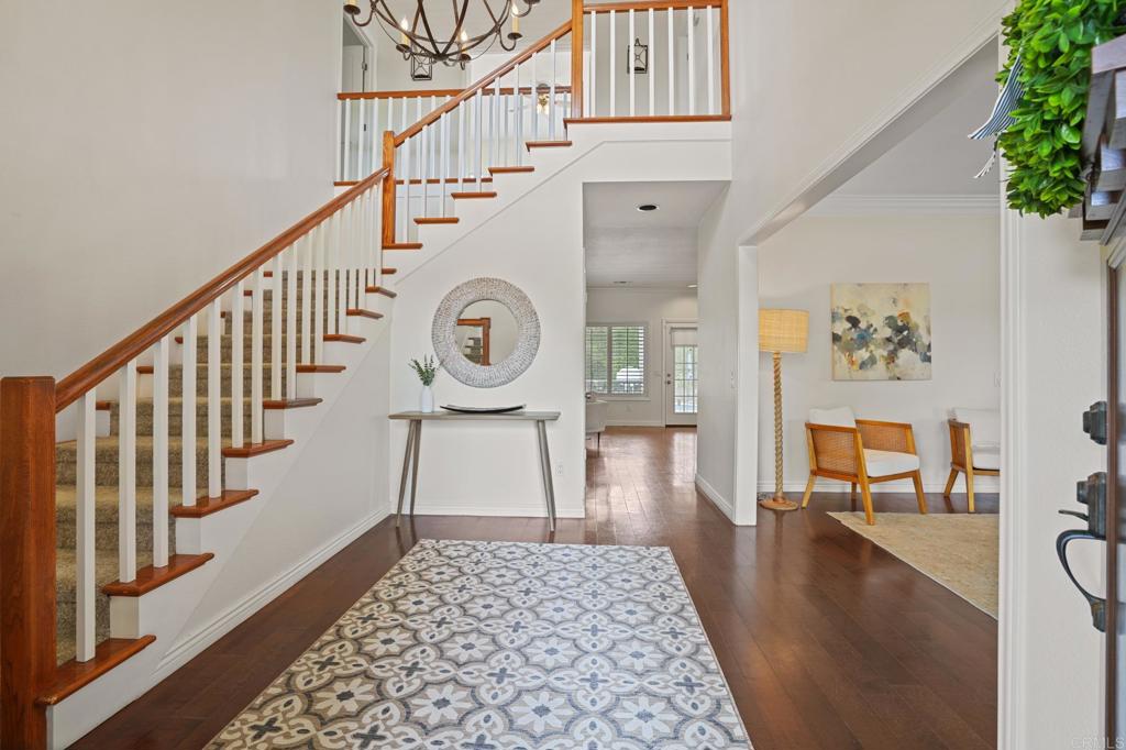 14403 Gaslight Court Poway, CA 92064 - Photo 9 of 58 a view of entryway and hall with wooden floor