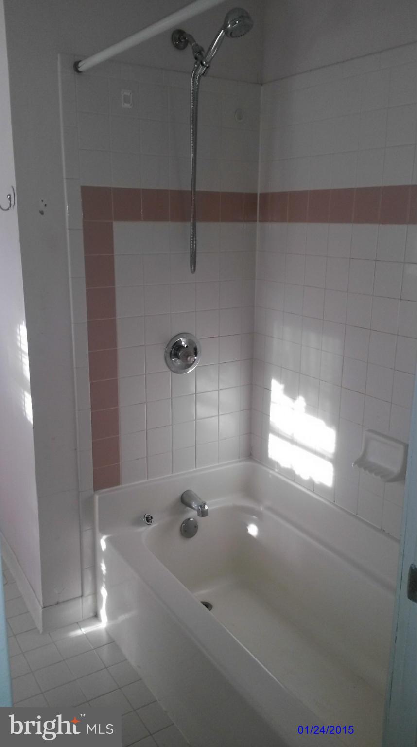 10213 Rodgers Road Fairfax, VA 22030 - Photo 13 of 26 a bathroom with a shower