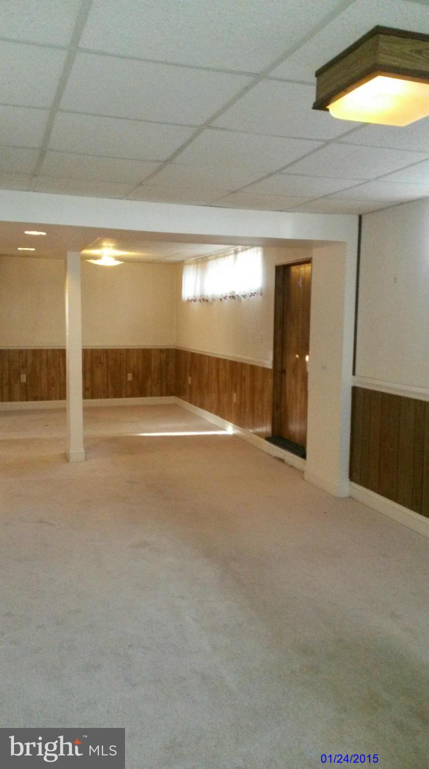 10213 Rodgers Road Fairfax, VA 22030 - Photo 15 of 26 a view of an empty room with a window