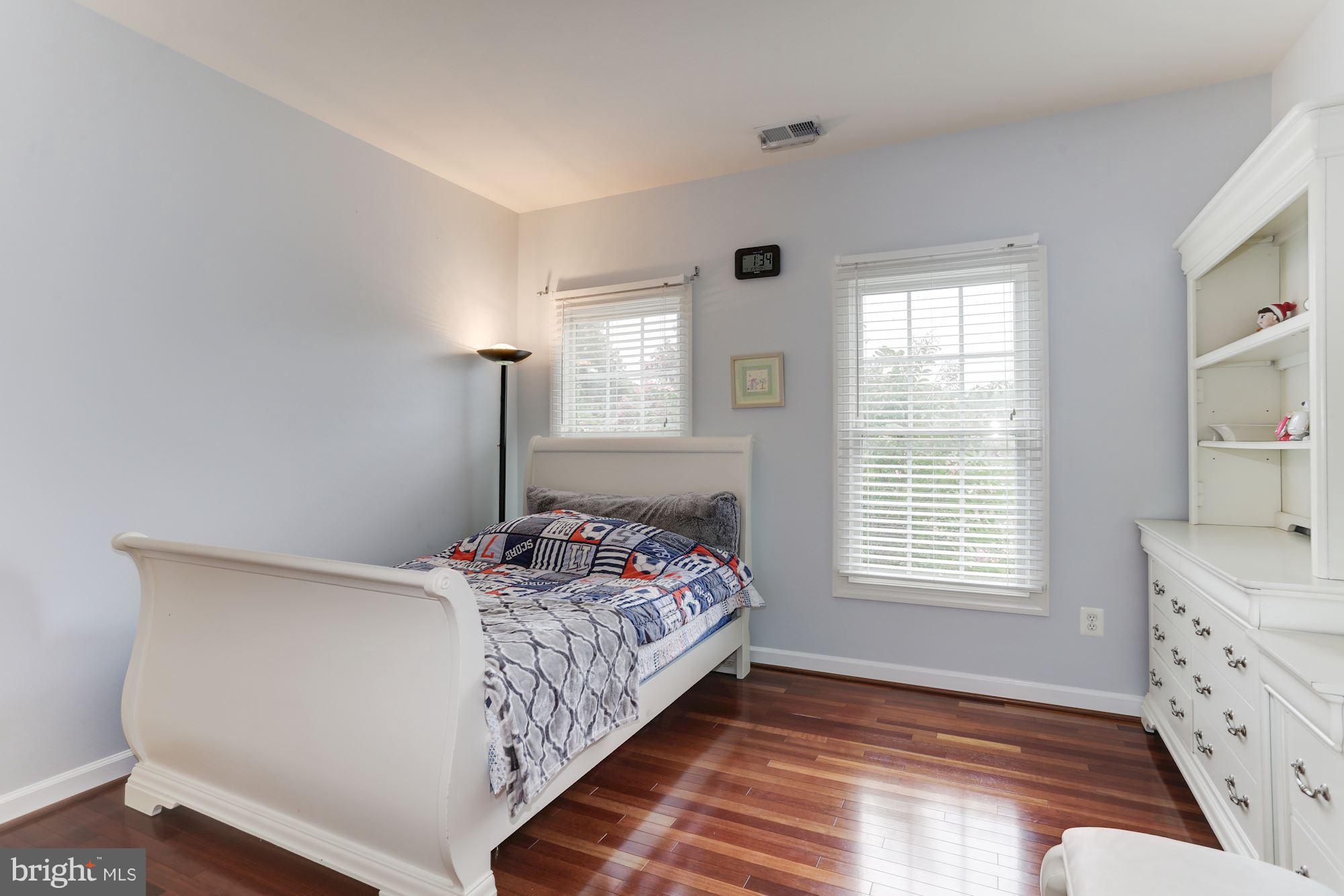 9204 Jones Mill Road Chevy Chase, MD 20815 - Photo 27 of 50 a bedroom with a bed and a window