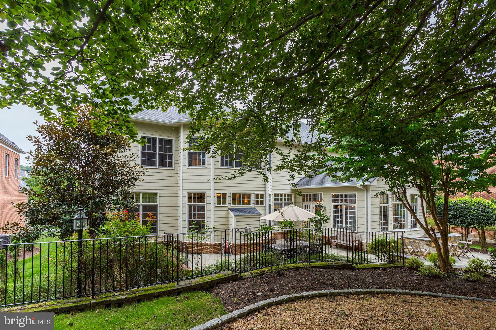 9204 Jones Mill Road Chevy Chase, MD 20815 - Photo 45 of 50 front view of a house with a yard