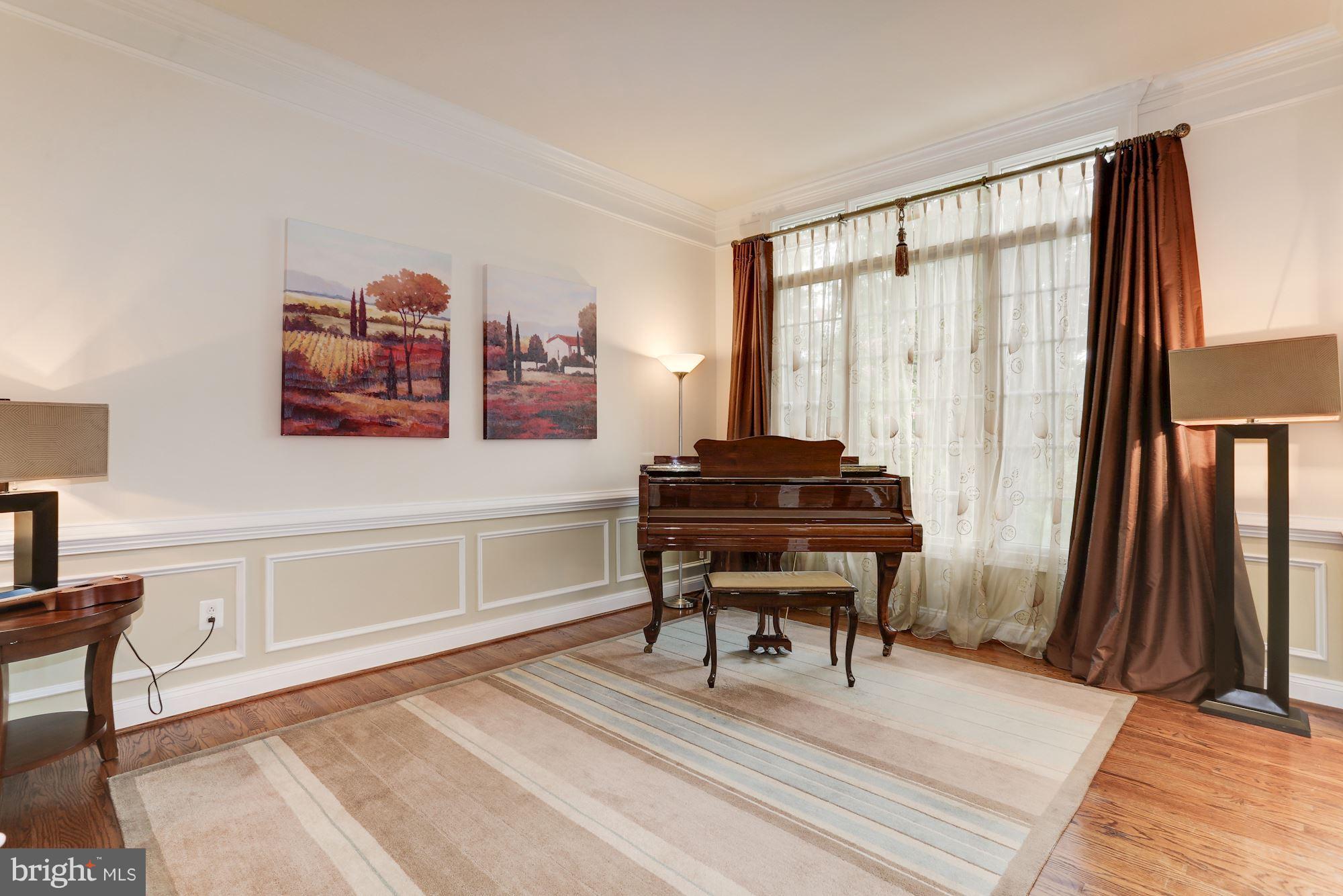 9204 Jones Mill Road Chevy Chase, MD 20815 - Photo 6 of 50 a view of a livingroom with furniture and a piano