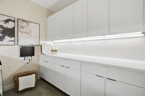 a kitchen with a sink and a cabinets